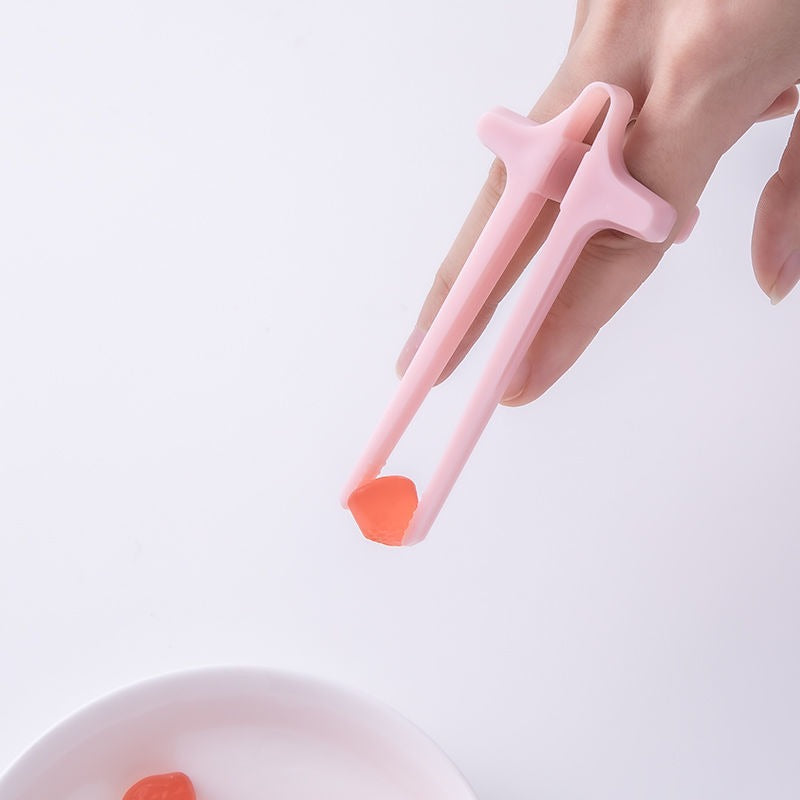 Playing games with fingers chopsticks snacking clips not dirty hands chopsticks finger loops