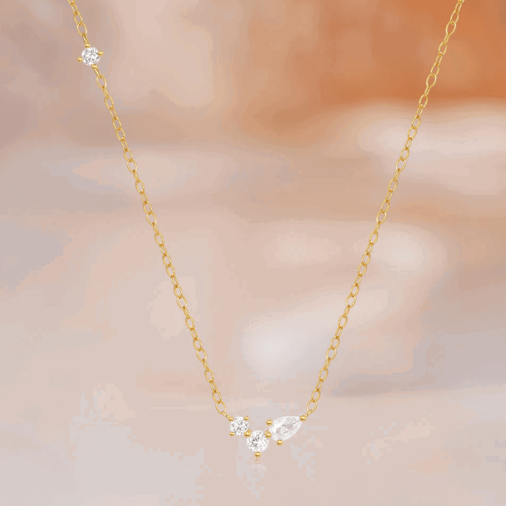 Orlina Delicate Necklace with Three Round and One Pear Cut Cubic Zirconia Stones