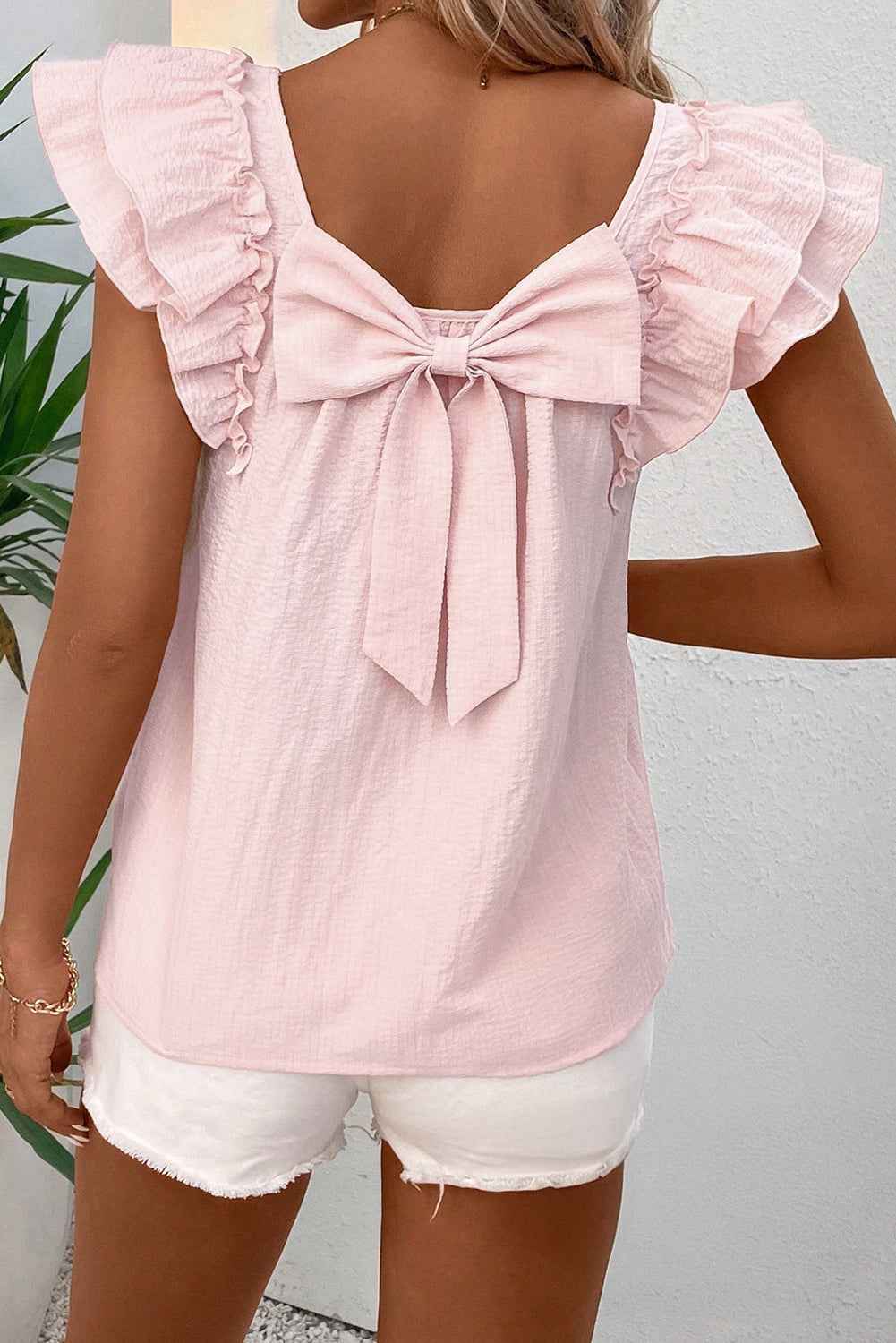 Gossamer Pink Ruffle Sleeve Blouse with Textured Bow Frills and Ruffles