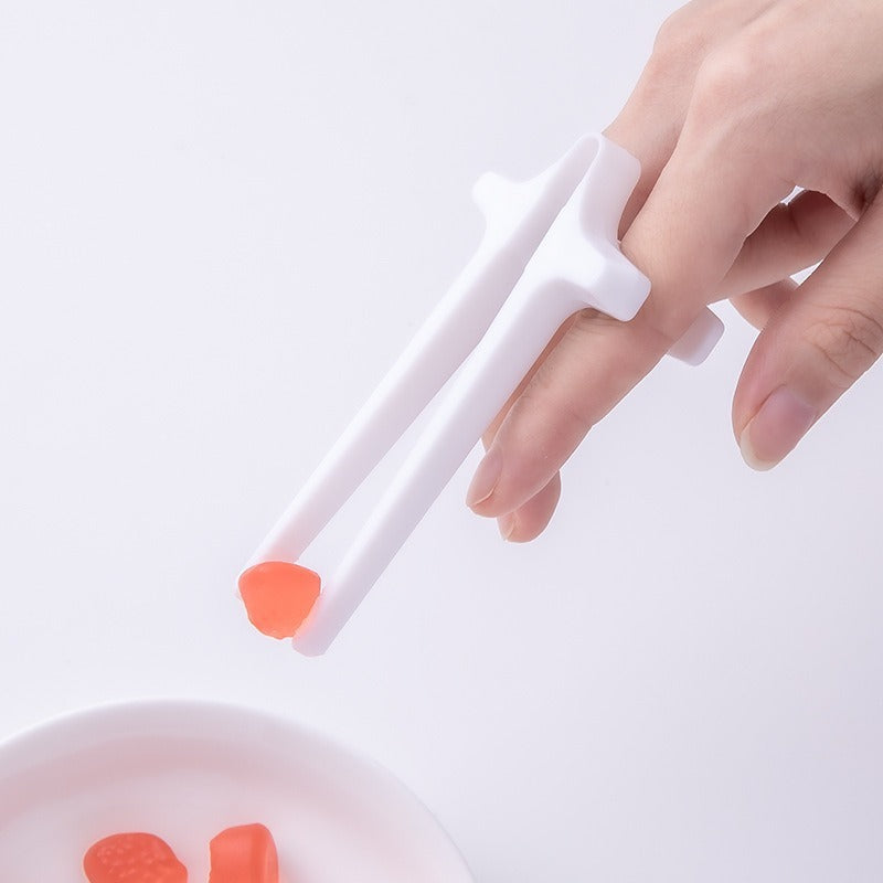 Playing games with fingers chopsticks snacking clips not dirty hands chopsticks finger loops