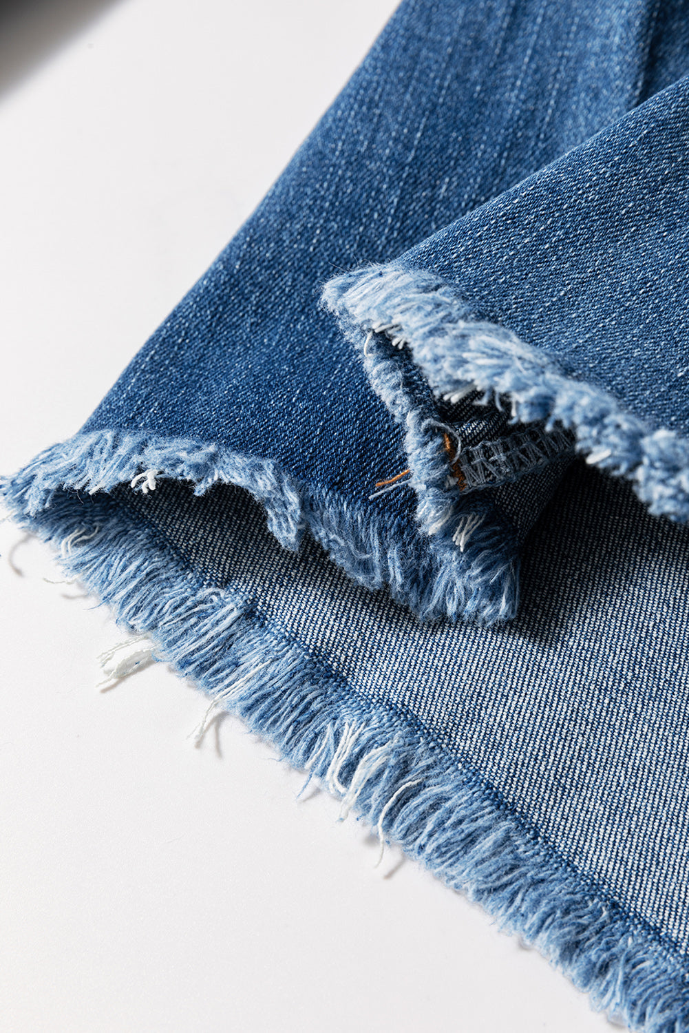 Sail Blue High Waist Jeans With Button Fly And Raw Hem