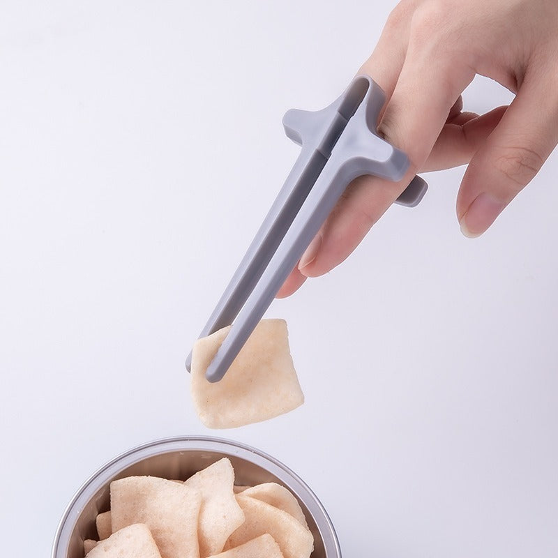 Playing games with fingers chopsticks snacking clips not dirty hands chopsticks finger loops