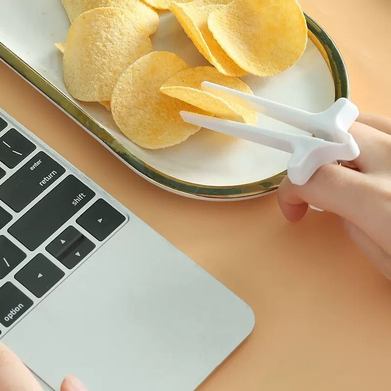 Playing games with fingers chopsticks snacking clips not dirty hands chopsticks finger loops