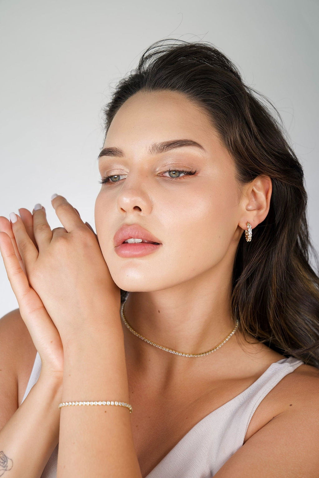 Radiant Glamour Huggie Hoop Earrings Embellished with Sparkling Cubic Zirconia