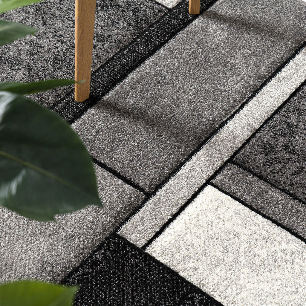 Area Rug Brilliance with Geometric Squares in Black White