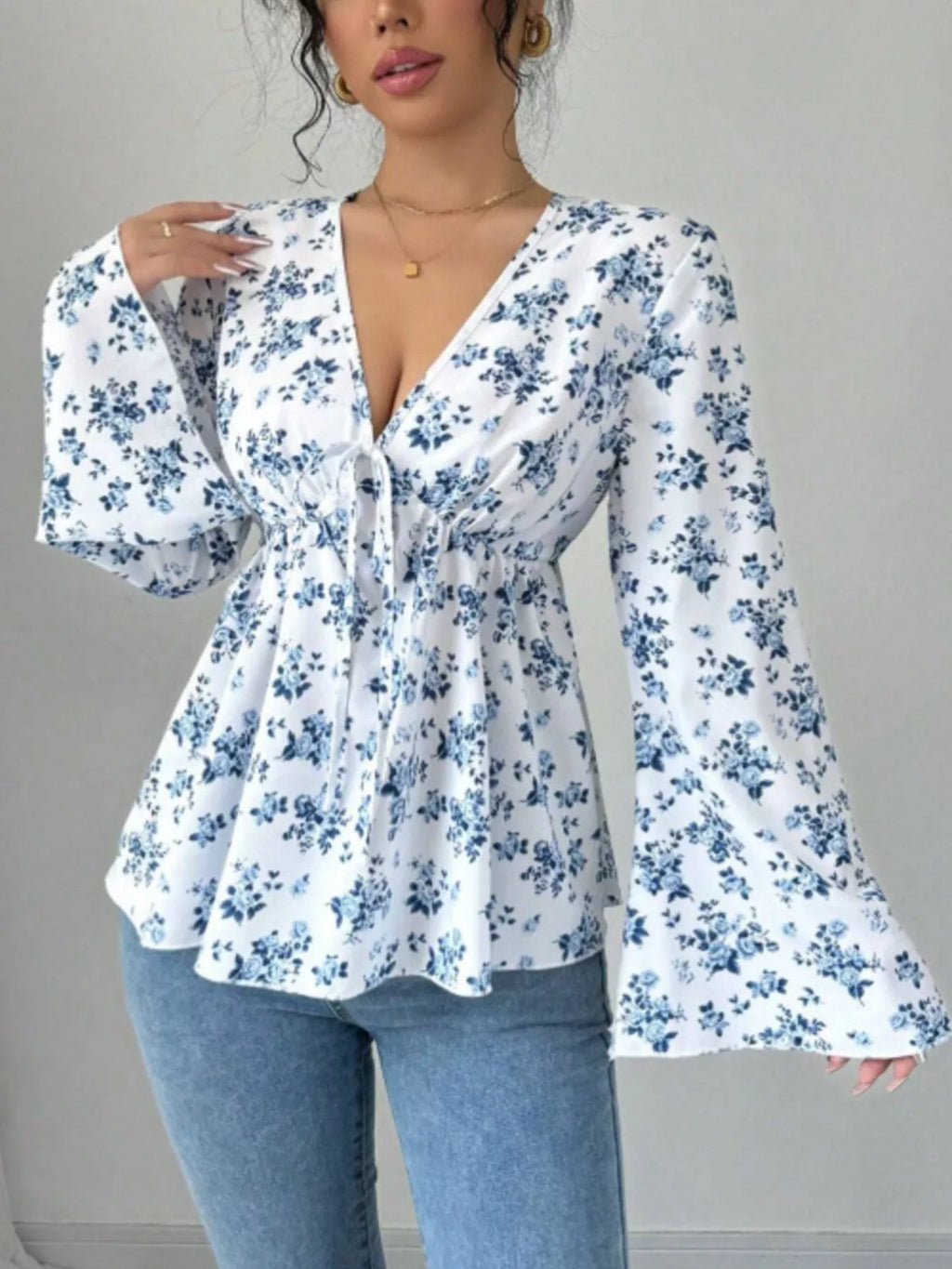 Floral Print V Neck Long Sleeve Buttoned Peplum Blouse