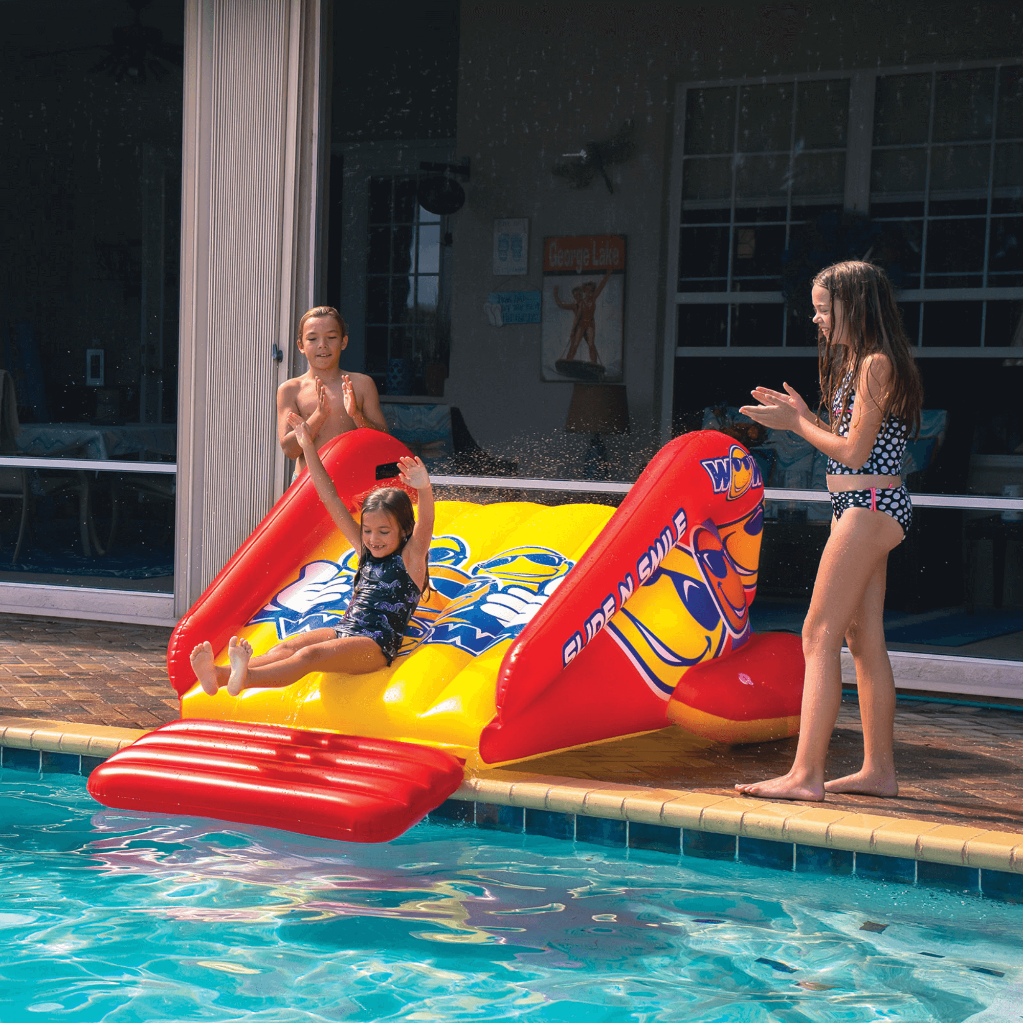 WOW Watersports Slide N Smile Inflatable Pool Slide with Sprinklers