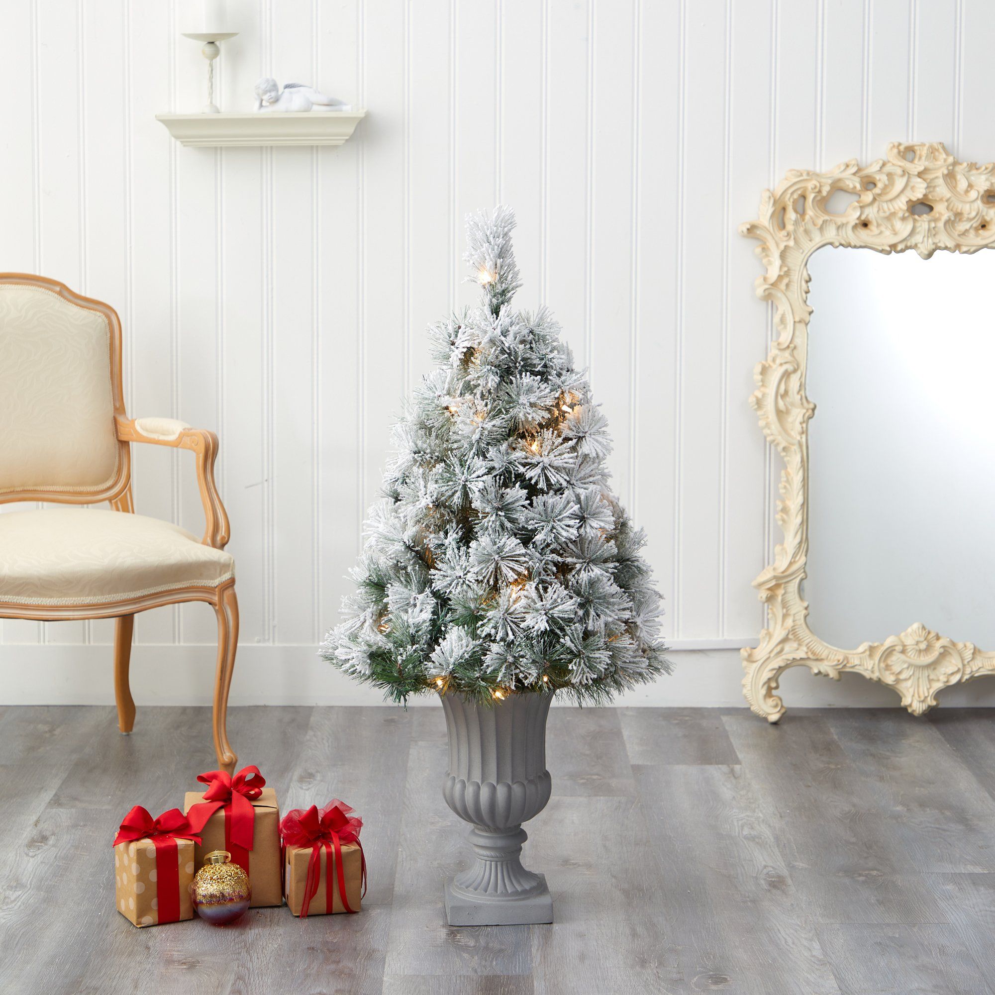 44” Flocked Oregon Pine Artificial Christmas Tree with 50 Clear Lights and 113 Bendable Branches in Decorative Urn