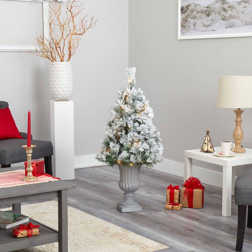 44” Flocked Oregon Pine Artificial Christmas Tree with 50 Clear Lights and 113 Bendable Branches in Decorative Urn