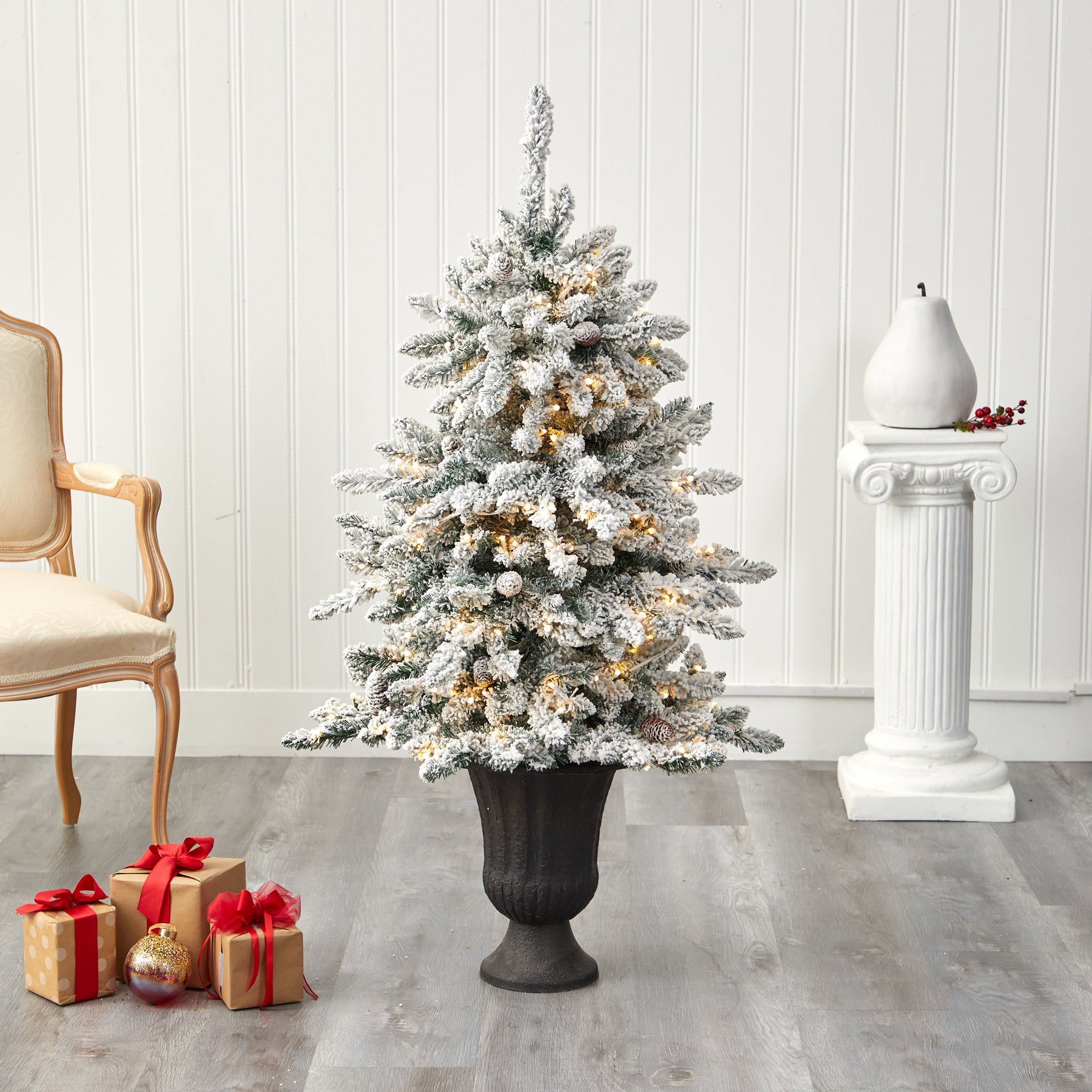 4.5’ Flocked Livingston Fir Artificial Christmas Tree with Pine Cones and 150 Clear Warm LED Lights in Charcoal Urn