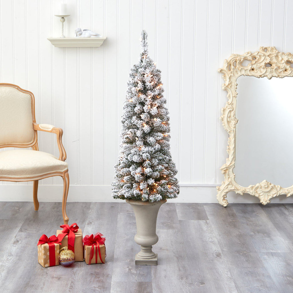4.5’ Flocked Pencil Artificial Christmas Tree with 100 Clear Lights and 216 Bendable Branches in Sand Colored Urn