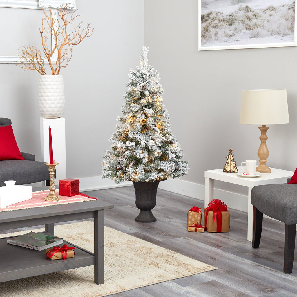 4.5' Flocked White River Mountain Pine Artificial Christmas Tree with Pinecones and 100 Clear LED Lights in Charcoal Urn