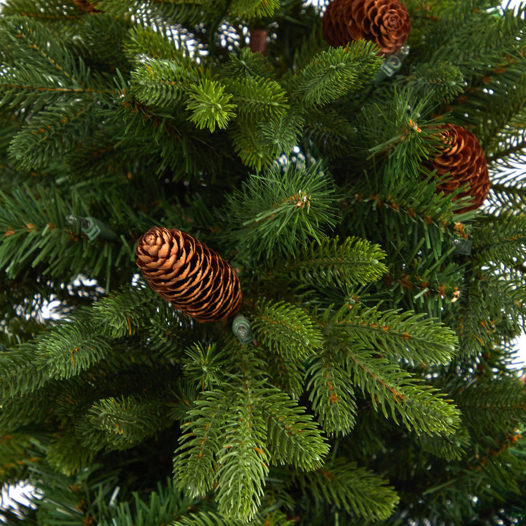 4.5’ Yukon Mountain Fir Artificial Christmas Tree with 100 Clear Lights, Pine Cones and 386 Bendable Branches in Charcoal Planter