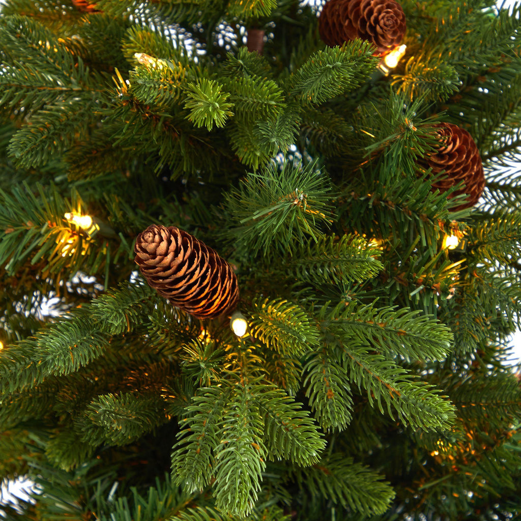 4.5’ Yukon Mountain Fir Artificial Christmas Tree with 100 Clear Lights, Pine Cones and 386 Bendable Branches in Charcoal Planter